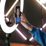 Woman Recording Herself On Smartphone